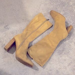 Tan faux suede knee boots.